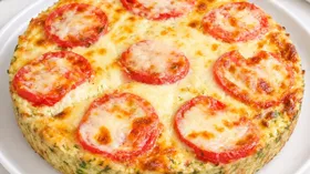 Кабачковая запеканка с помидорами и сыром