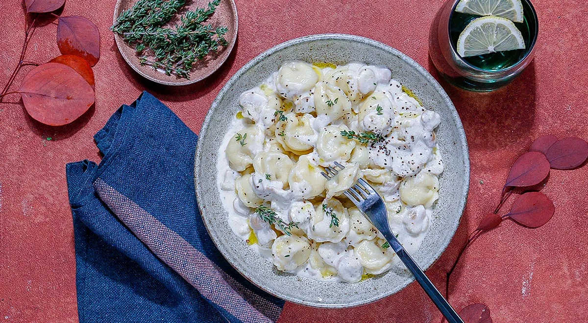 Пельмени с грибным соусом и трюфельным маслом