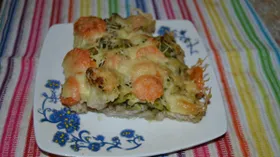 Рыба, запеченная с овощами под сыром