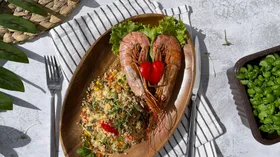 Лангустины с кускусом и овощами