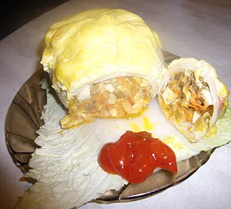 Кальмары, фаршированные креветками и овощами