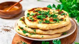 15 рецептов вкусных домашних лепешек на сковороде и в духовке, которые сможет приготовить каждый