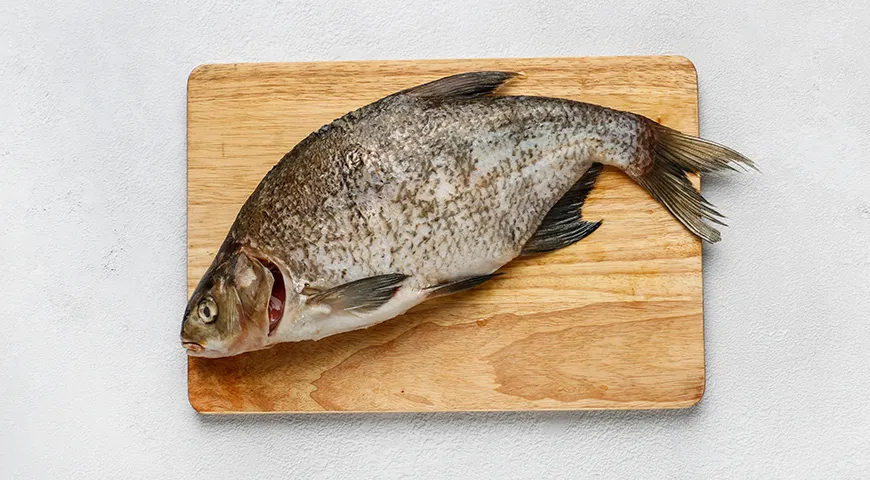 Лещ, запеченный с капустой в духовке