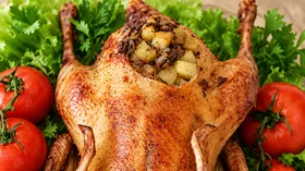 Утка фаршированная картофелем и грибами