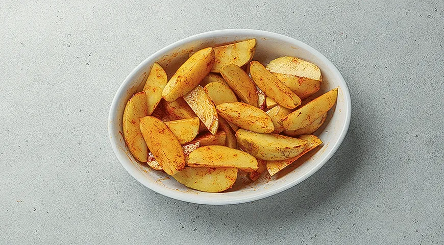 Картофельные дольки с беконом и сыром