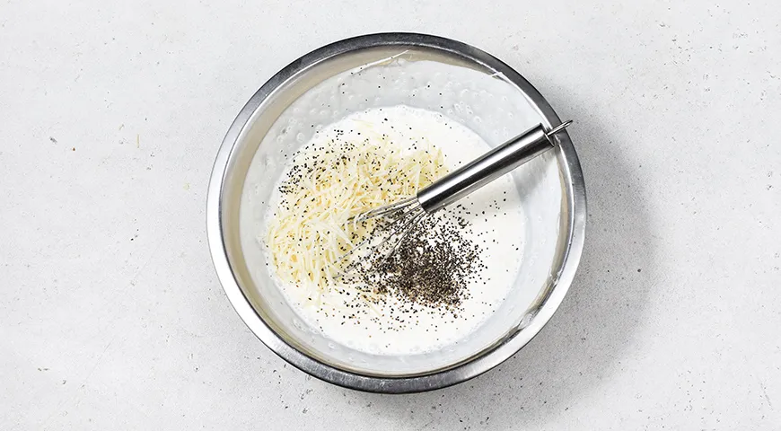 Пельмени в горшочке с сыром