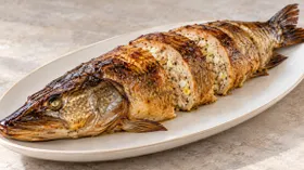 Щука, фаршированная рисом