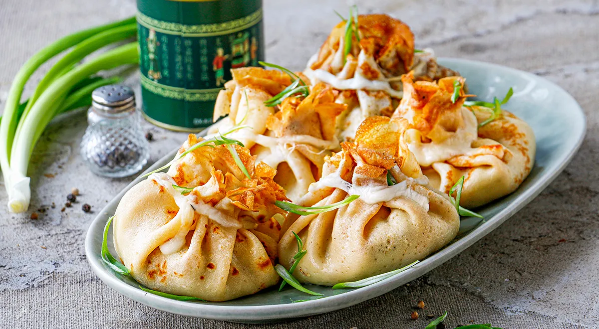 Блинные мешочки с жюльеном из красной рыбы