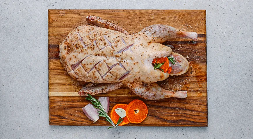 Цитрусовая утка с клюквой и картофелем