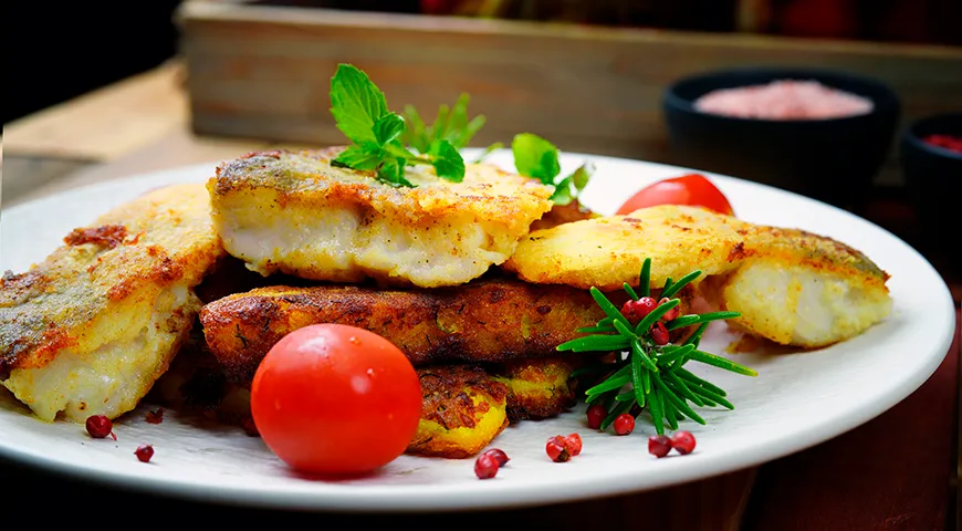 Запеченный окунь с овощами