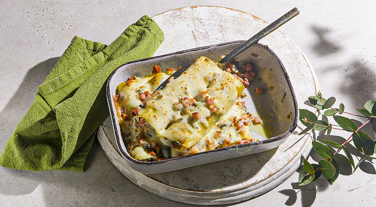 Каннеллони, фаршированные грибами и ветчиной