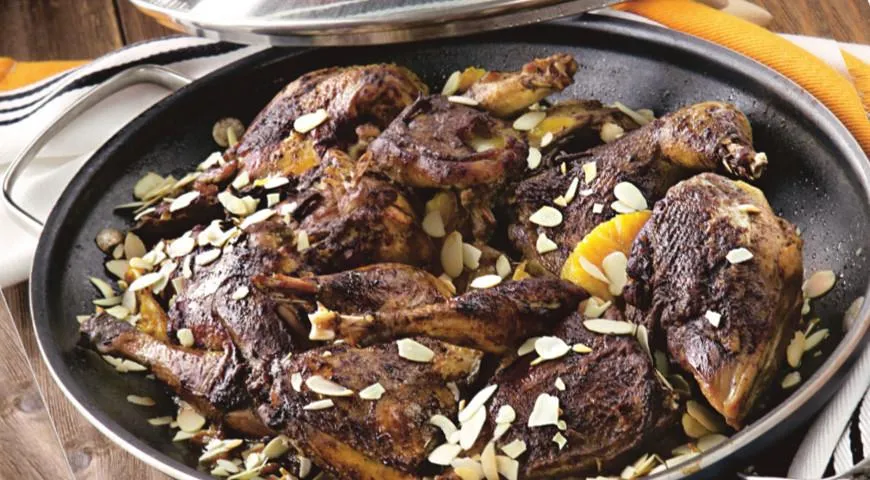 Фазан, тушенный с апельсинами и виноградным соком