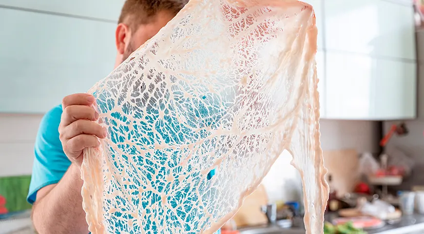 Сетка из бараньего жира в виде ажурного кружева