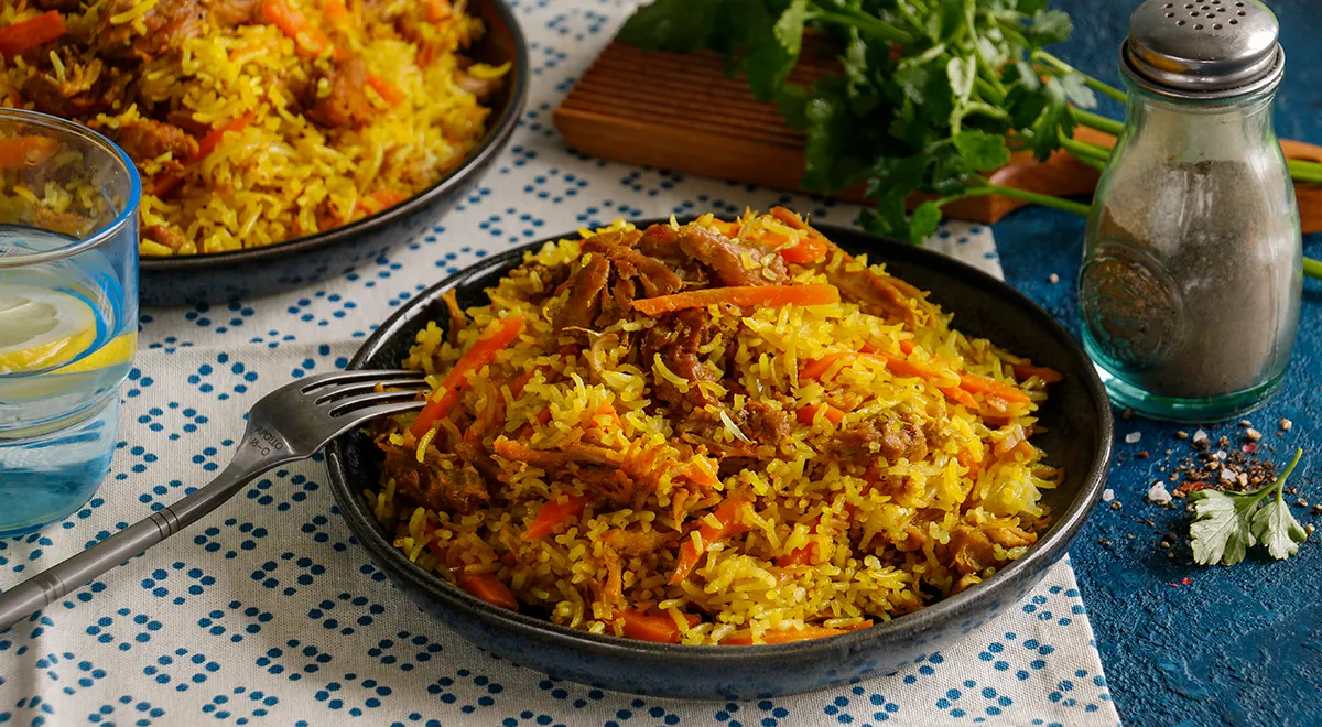 Рецепт риса с тушенкой на сковороде