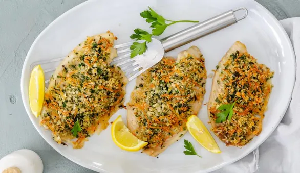 Тилапия под румяной корочкой, приготовленной с орегано