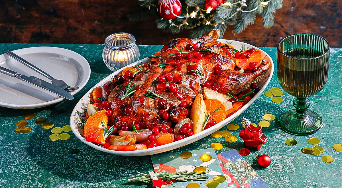 Цитрусовая утка с клюквой и картофелем