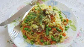 Овощной плов с куриными желудками