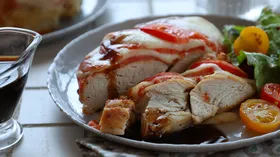 Куриное филе с помидорами и сыром в духовке
