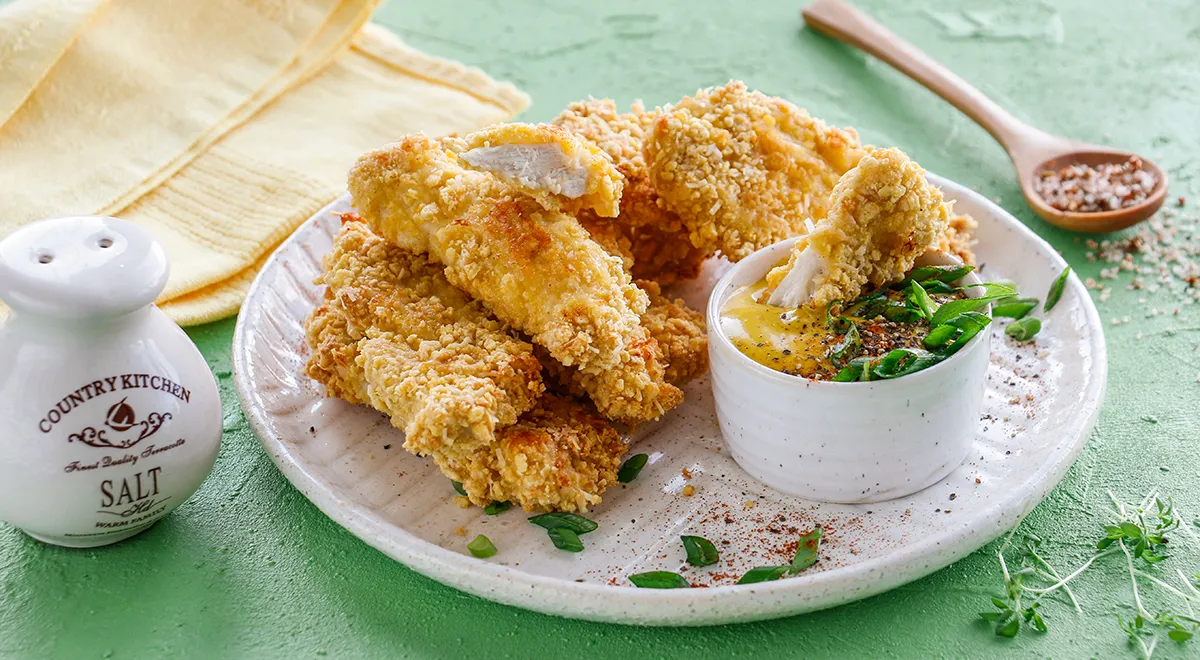 Рецепт куриного филе в панировке из сыра и кукурузных хлопьев в духовке (можно использовать гречневые хлопья)