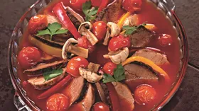 Мясо с овощами в томатной заливке