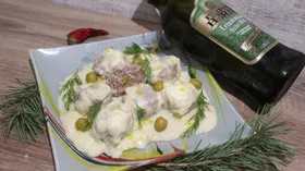 Тефтели с оливками с соусом авголемоно (Юварлакия)