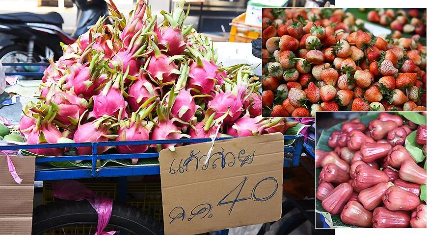 Тайские фрукты: питахайя, клубника и розовые яблоки.