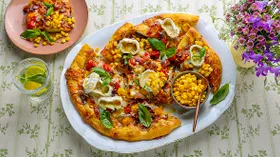 Лепешка с помидорами, кукурузой и сыром в духовке