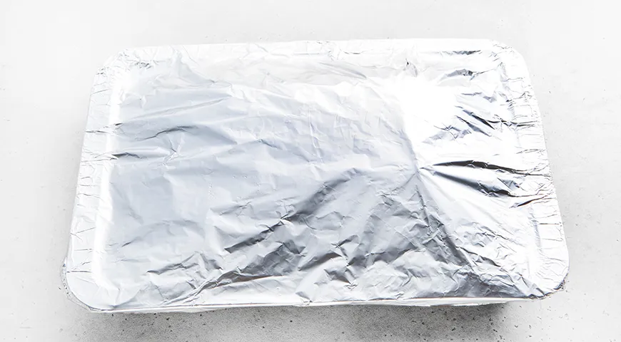 Гармошка из свинины с помидорами