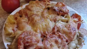 Тилапия с картофелем и помидорами