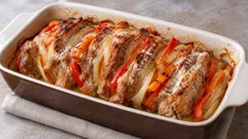 Маринованная свинина, запеченная с овощами