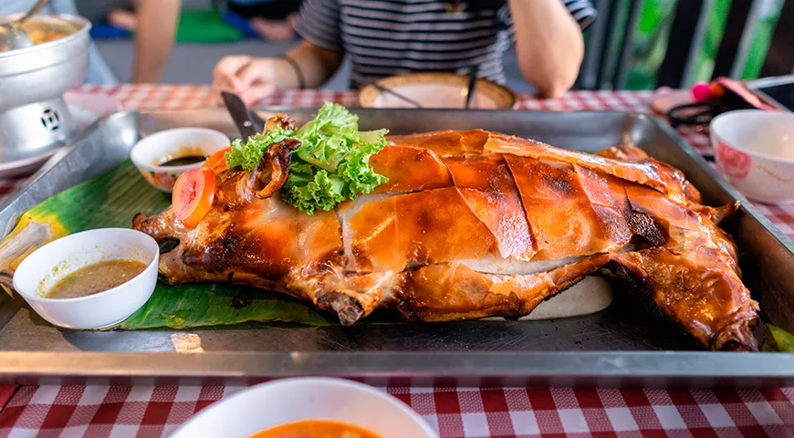 Молочный поросенок, приготовленный на гриле